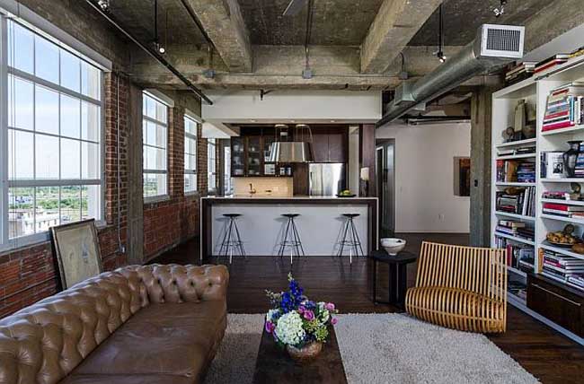 industrial-living-room-with-exposed-wooden-beams